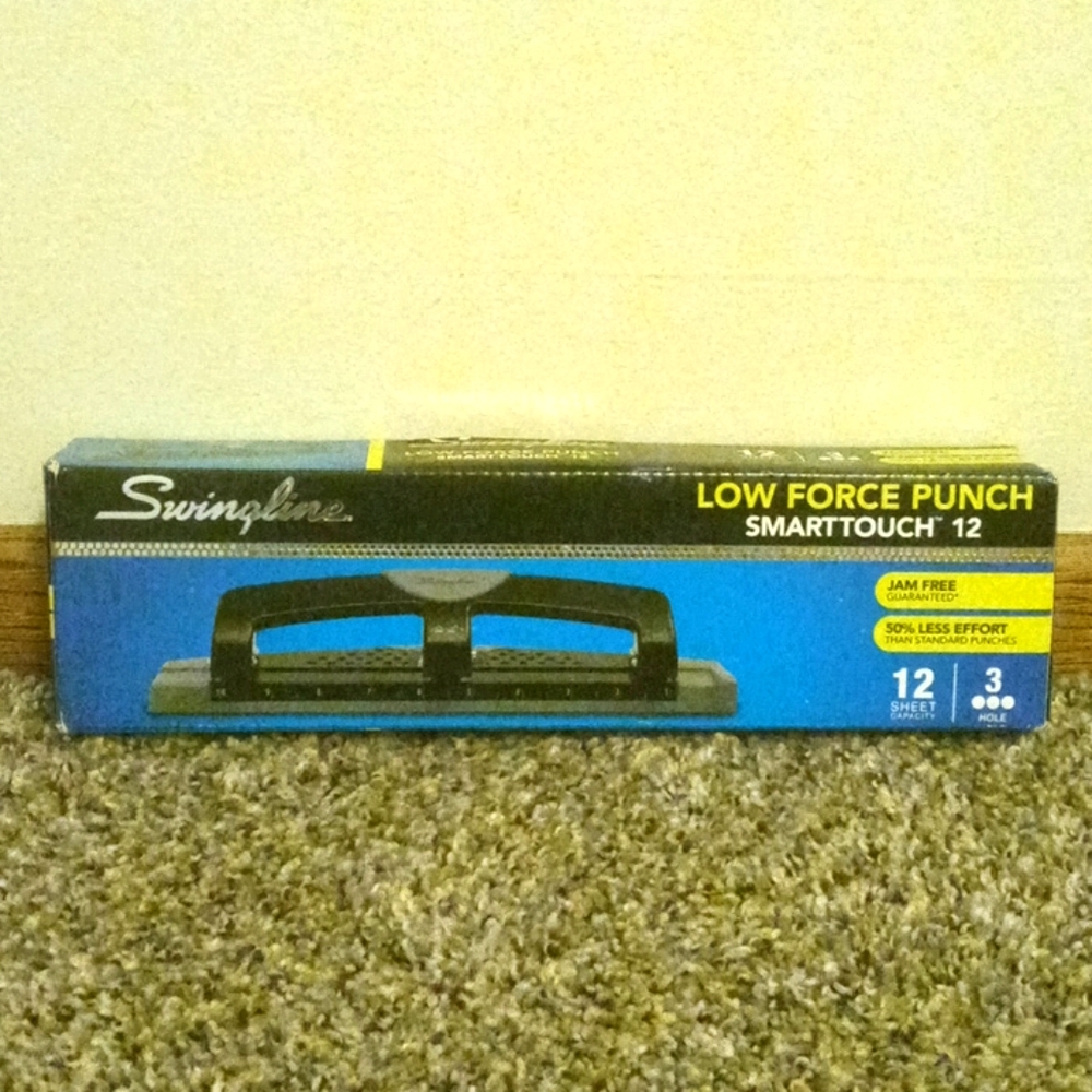 Hole puncher. NEW